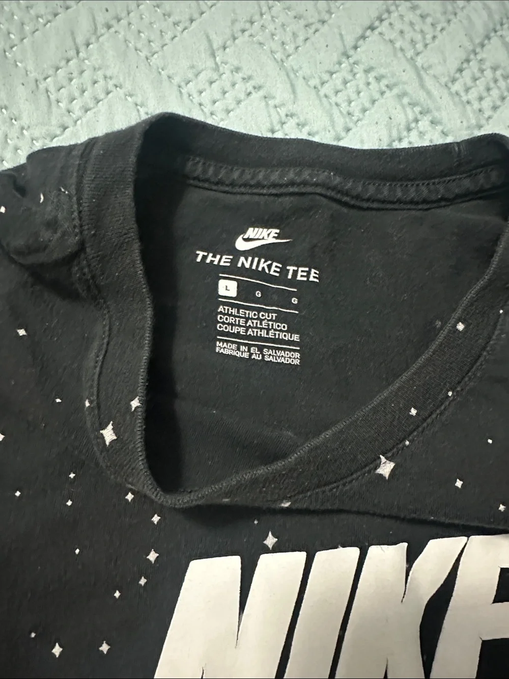 Nike Black Tee with White Swoosh and Star Print size large